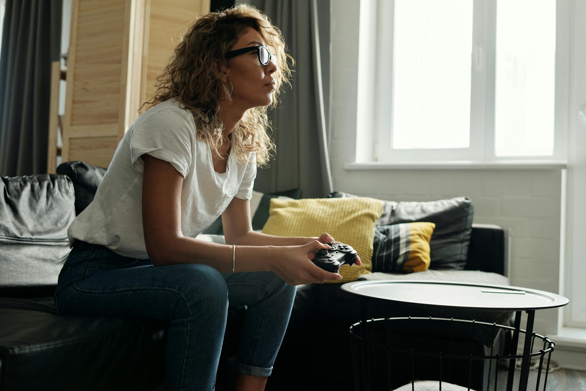 photo of woman playing game console